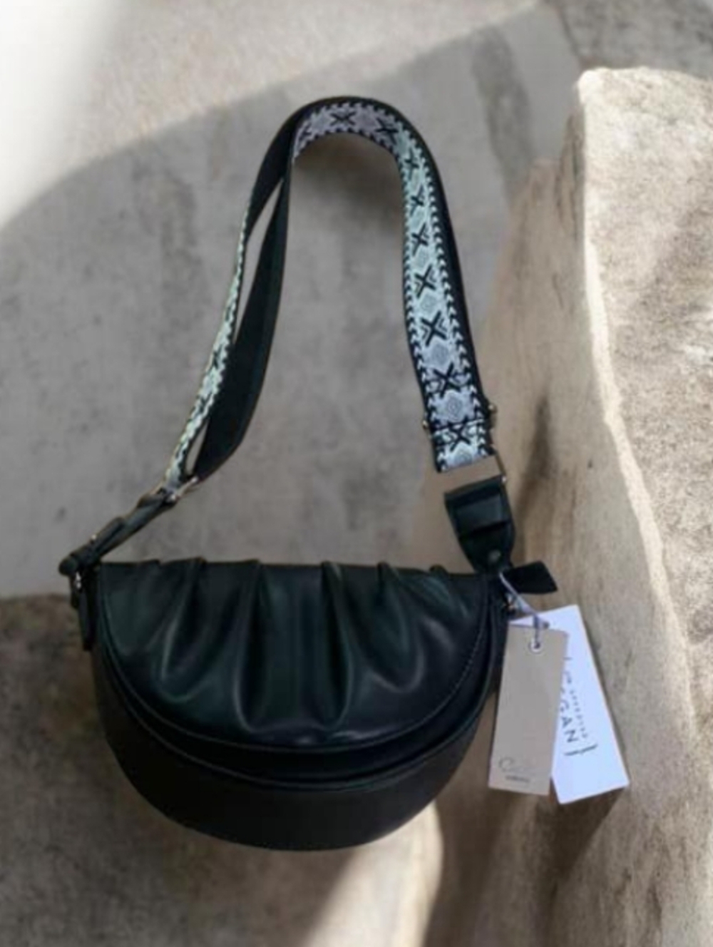 Women's Black Crescent Shoulder Bag with Patterned Strap